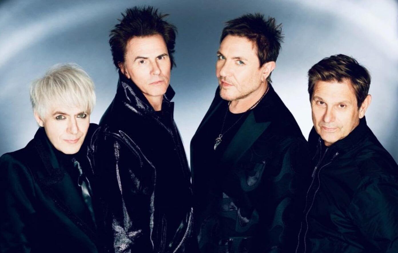 Watch Duran Duran’s hedonistic video for “ANNIVERSARY” featuring Elton John, Madonna and Stormzy lookalikes