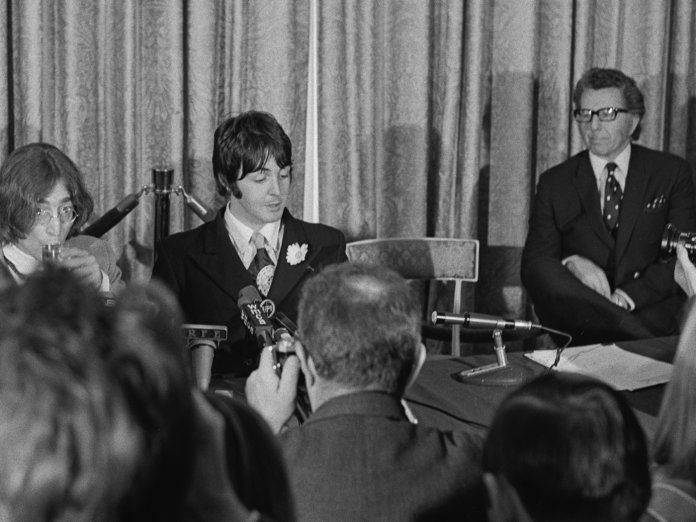 Denis O’Dell (right) with John Lennon and Paul McCartney. Credit: Don Paulsen/Michael Ochs Archives/Getty Images